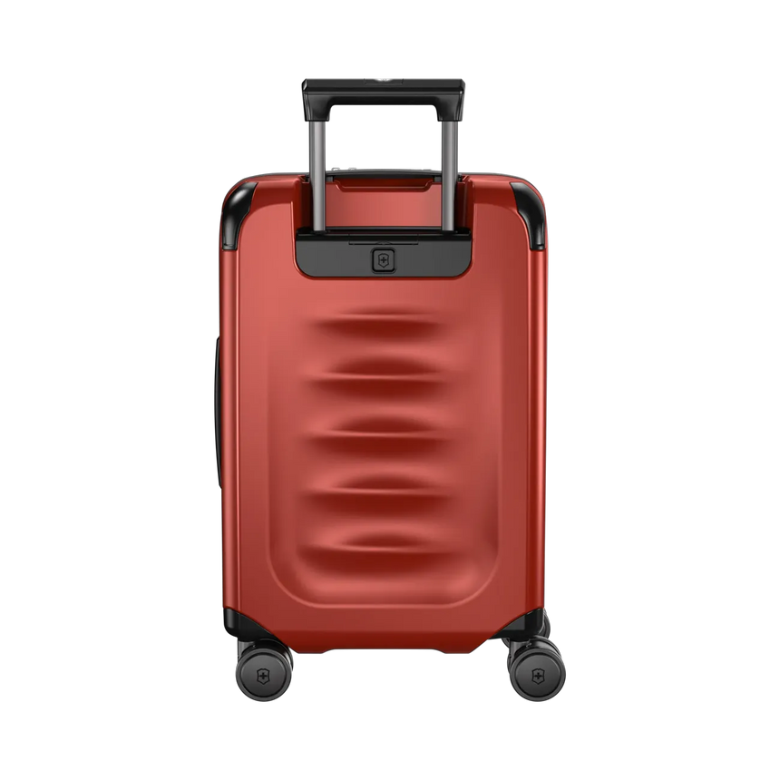 Red hardshell rolling suitcase with a retractable handle and wheels.