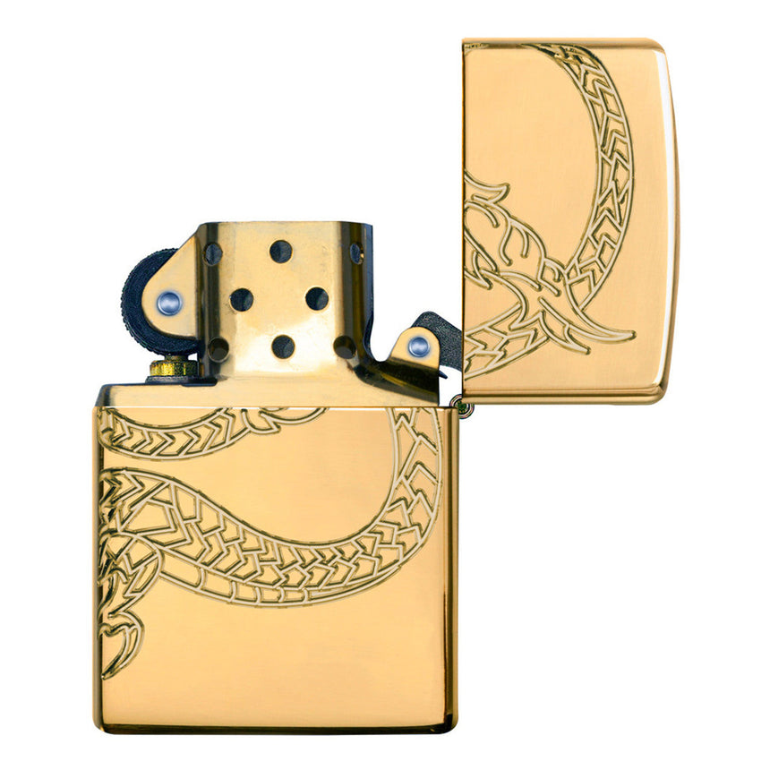 Gold-colored Zippo lighter with an engraved dragon design.