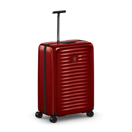 Red hardshell rolling suitcase with horizontal ridges and a retractable handle.