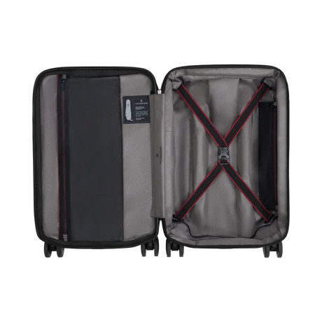 Open suitcase with interior compartments and straps visible.