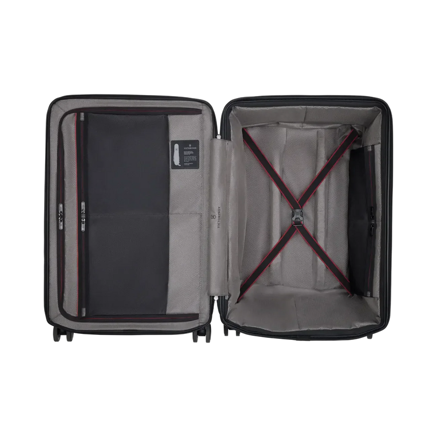 Open suitcase showing its interior compartments and straps.