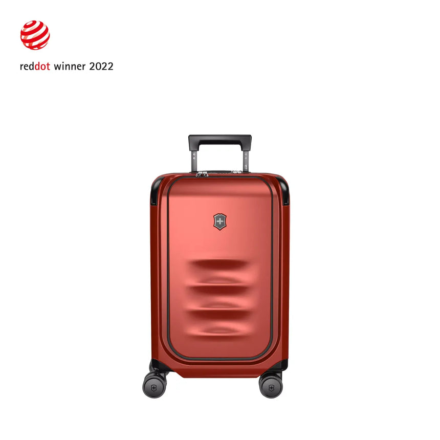 Red metallic hardshell carry-on suitcase with wheels and a retractable handle.