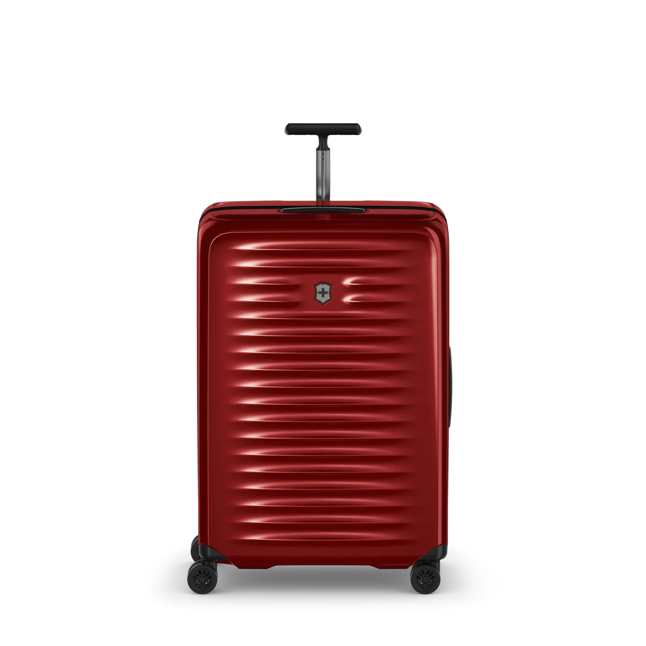 Red hardshell rolling suitcase with horizontal ridges and a retractable handle.