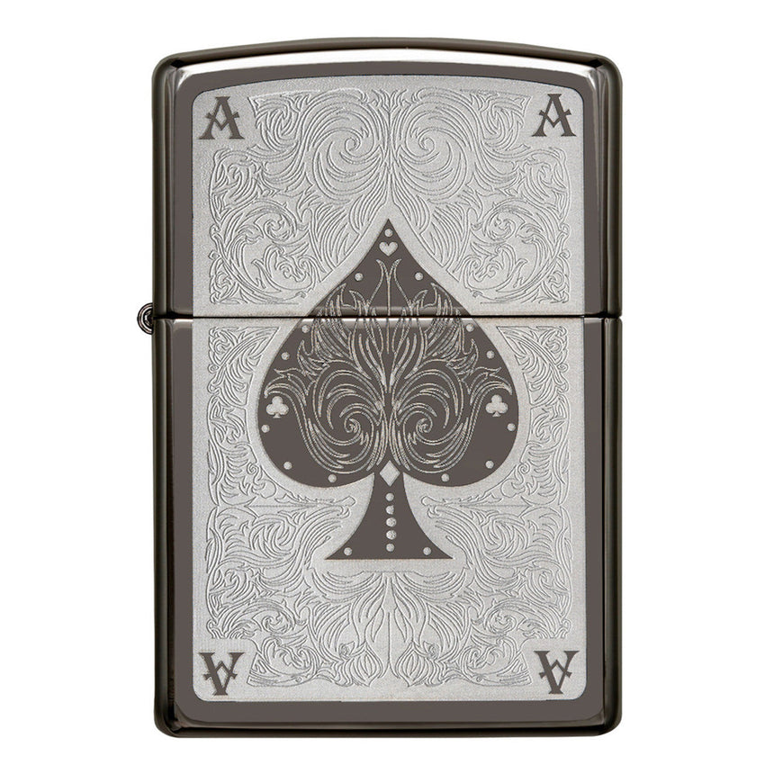 Ornate metal lighter featuring an engraved ace of spades design.