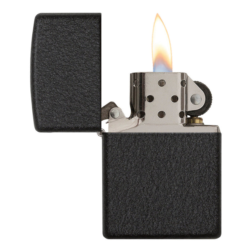 Lit Zippo-style lighter with a black matte finish and open flame.