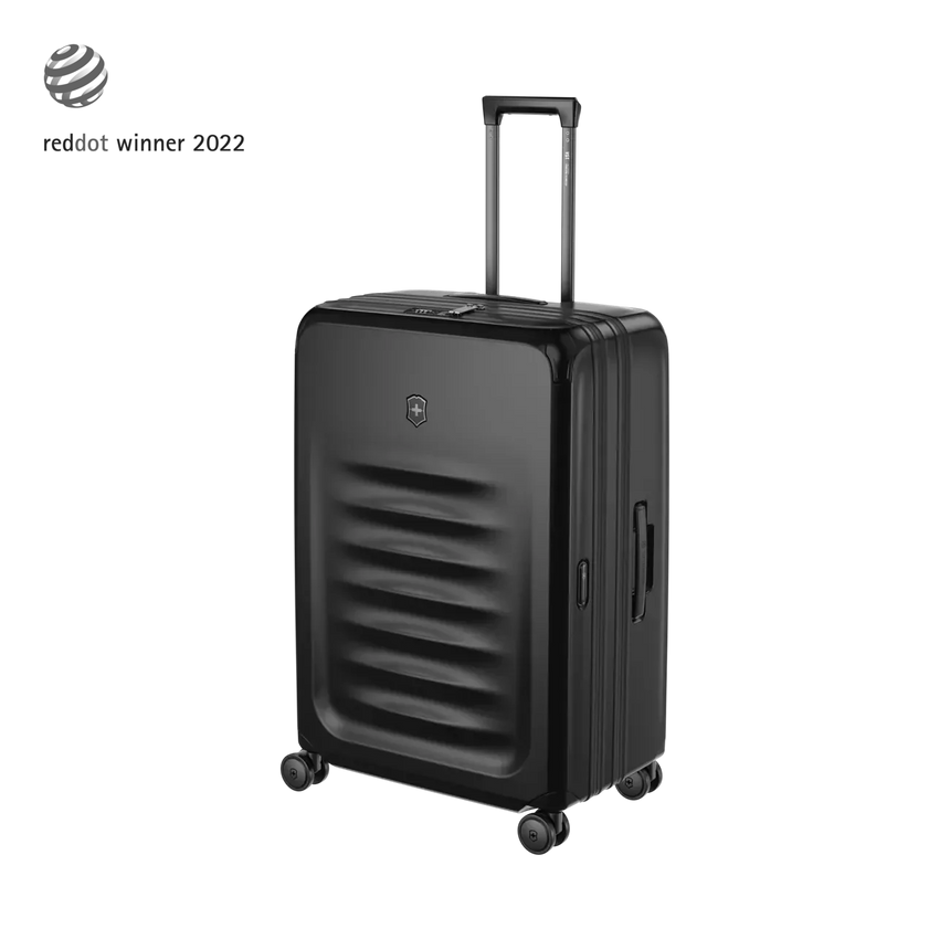 Black hardshell suitcase with horizontal ridges and a retractable handle.
