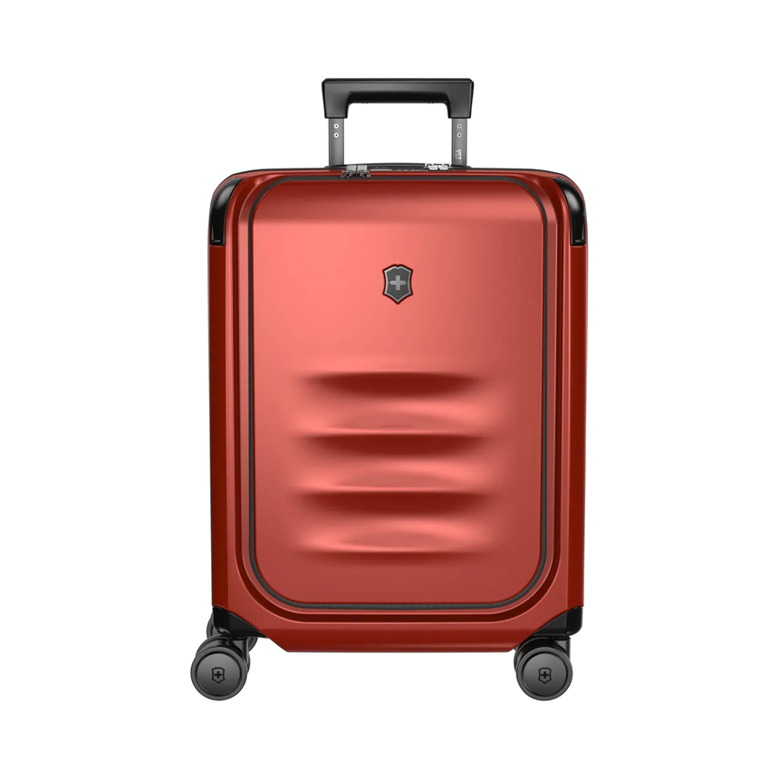 Red hardshell rolling suitcase with a retractable handle and wheels.