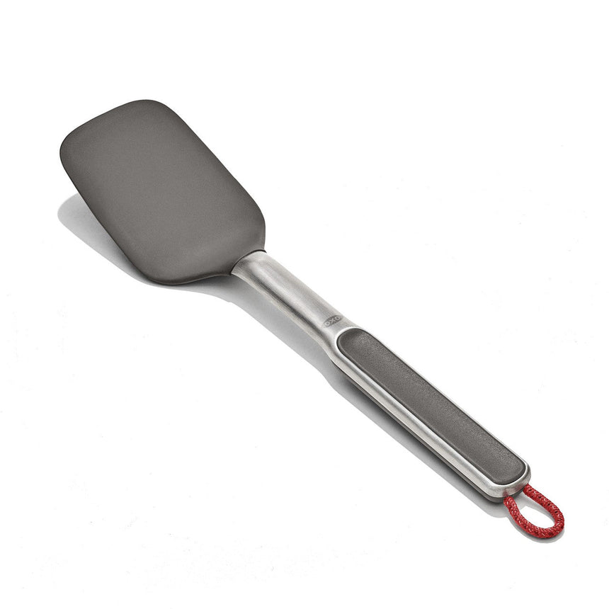 Stainless steel spatula with a gray silicone head and red hanging loop.
