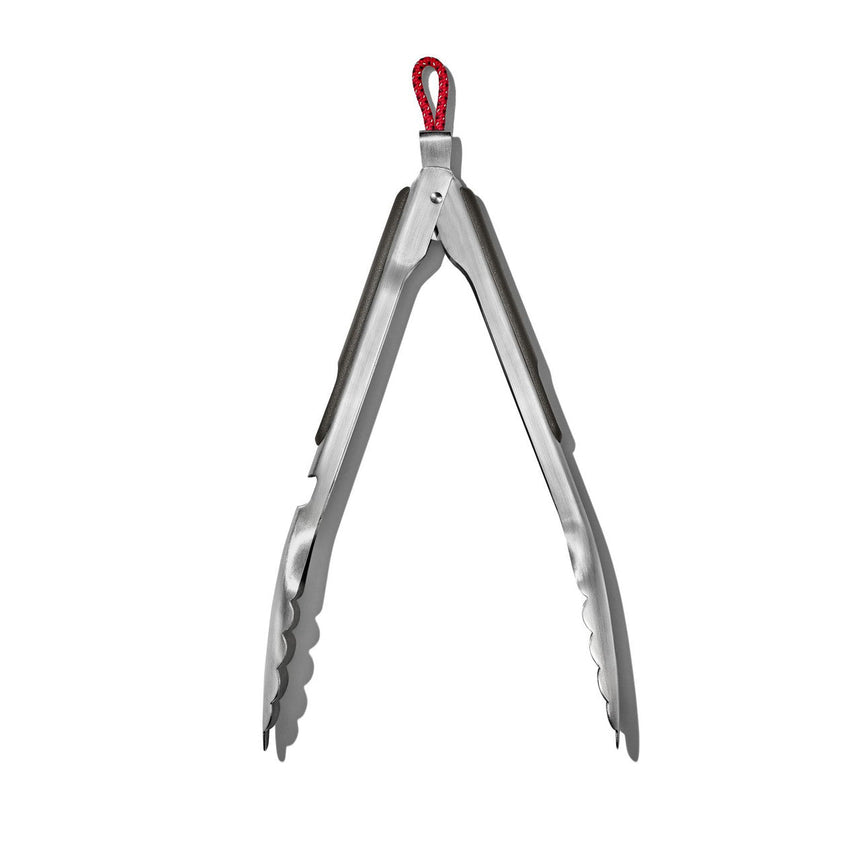 Kitchen tongs with stainless steel arms and a red loop handle.