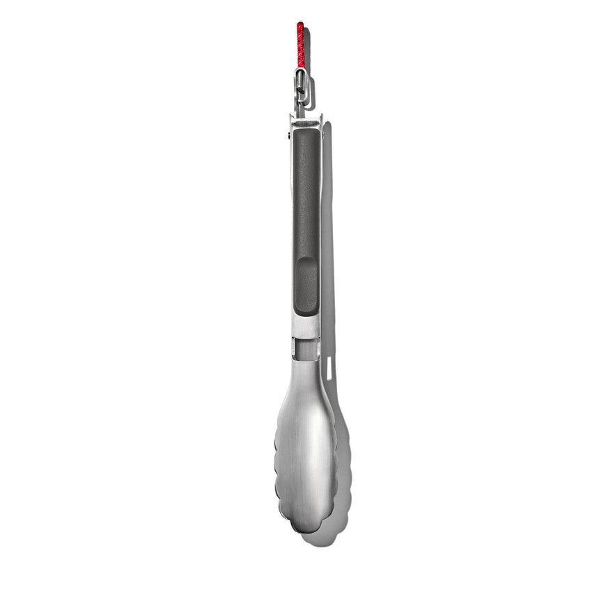 Kitchen tongs with a red accent on the handle.