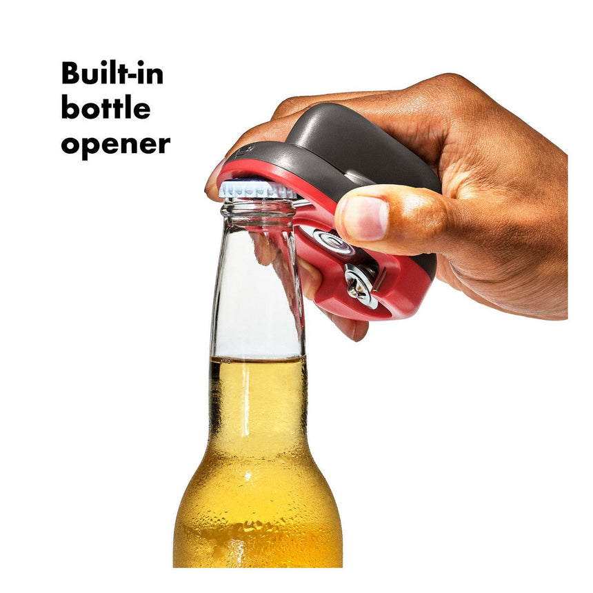 Hand-held can opener with a built-in bottle opener function.