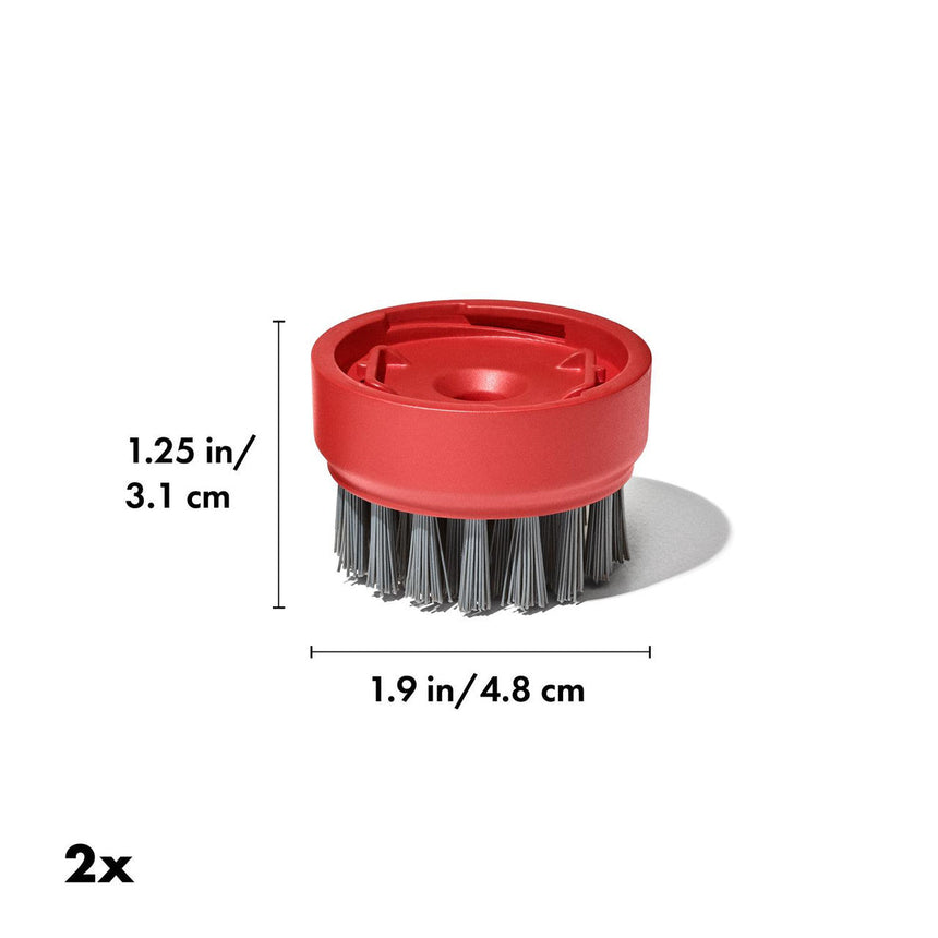 Circular red brush head with gray bristles for cleaning.