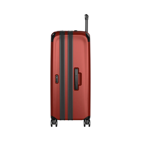 Red hardshell suitcase with black trim and wheels.