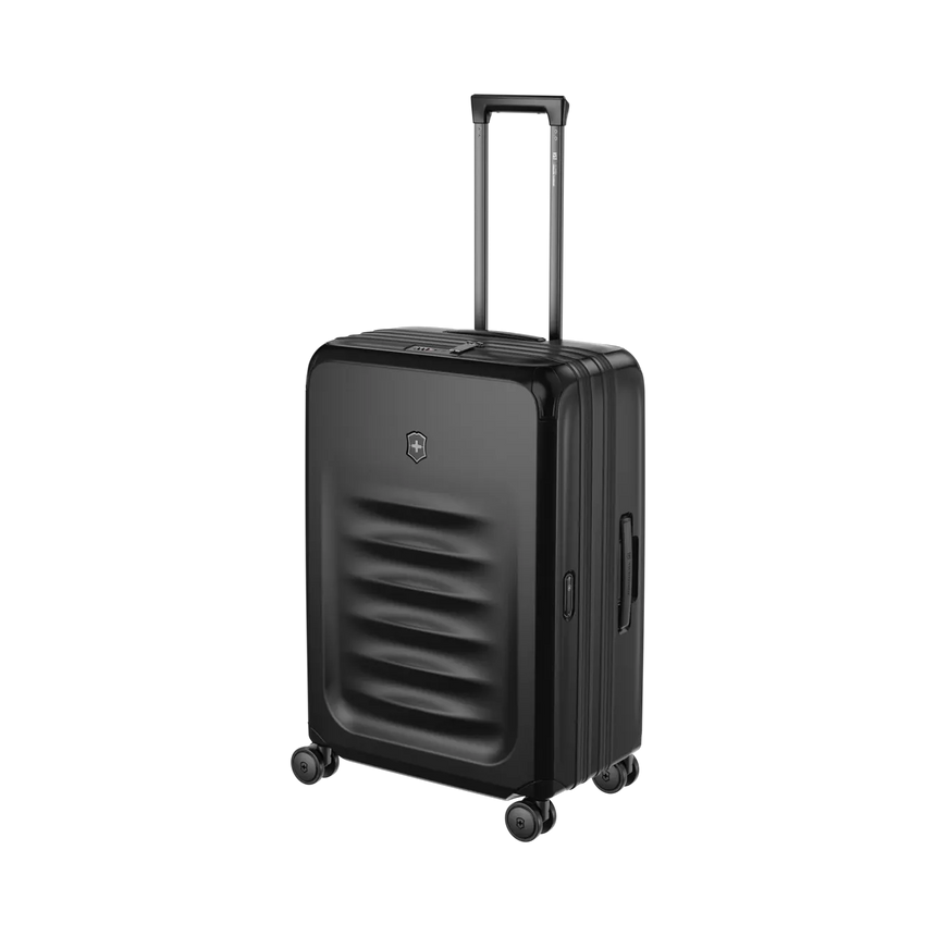 Black hardshell rolling suitcase with horizontal ridges on the front.