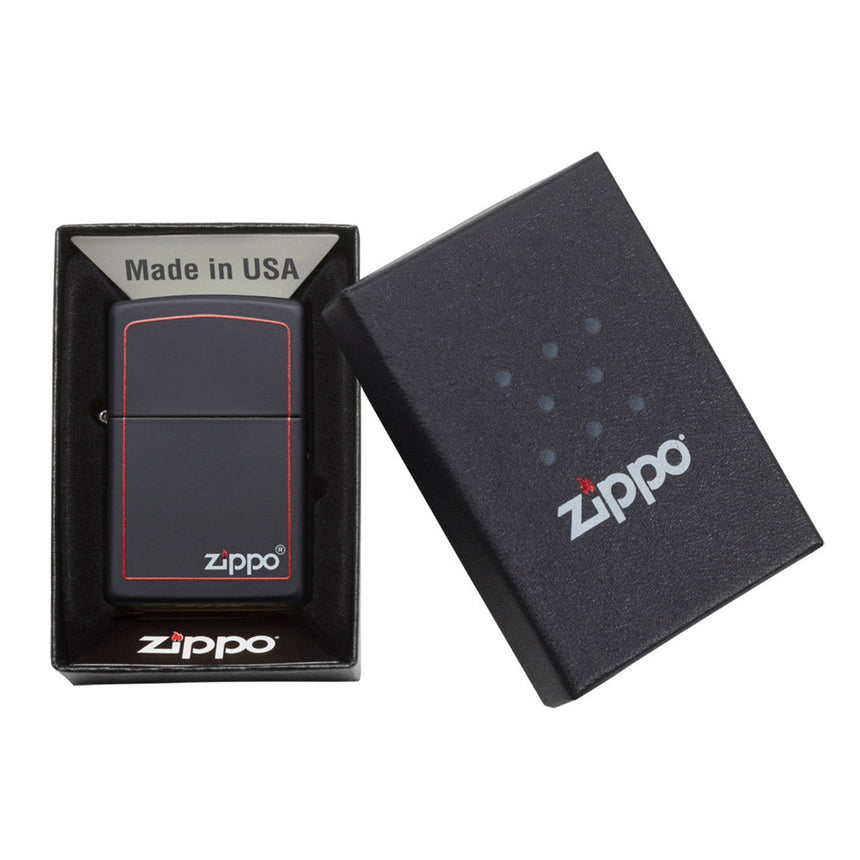Zippo lighter in its packaging box.