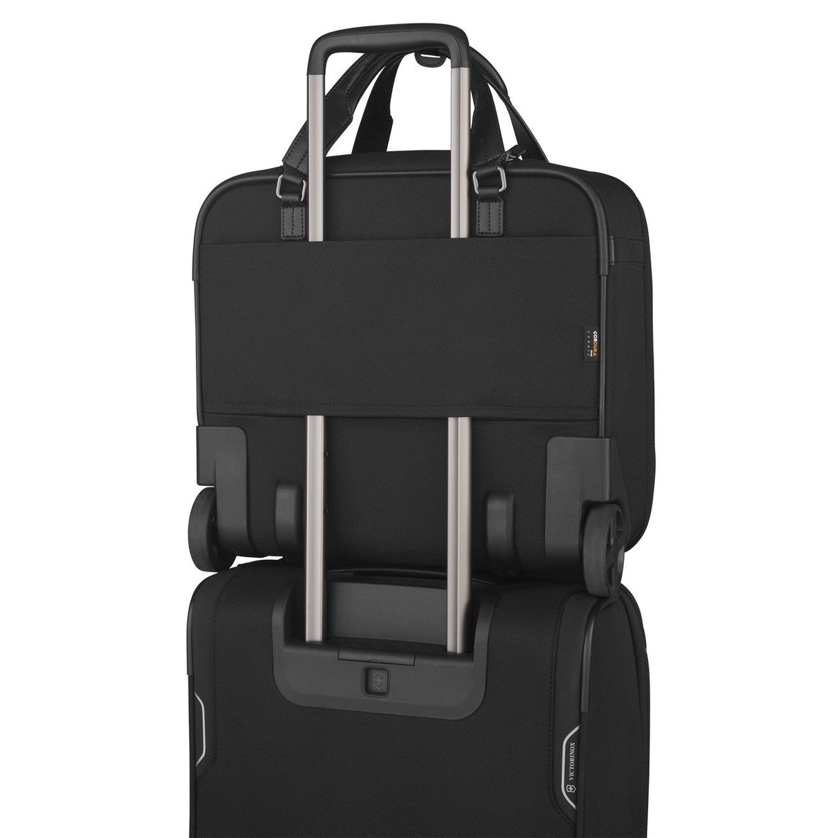 Black laptop bag with a luggage strap for attaching to rolling suitcases.