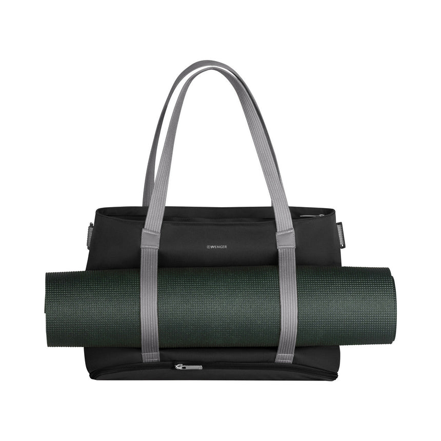 Black tote bag with gray handles carrying a rolled-up yoga mat.