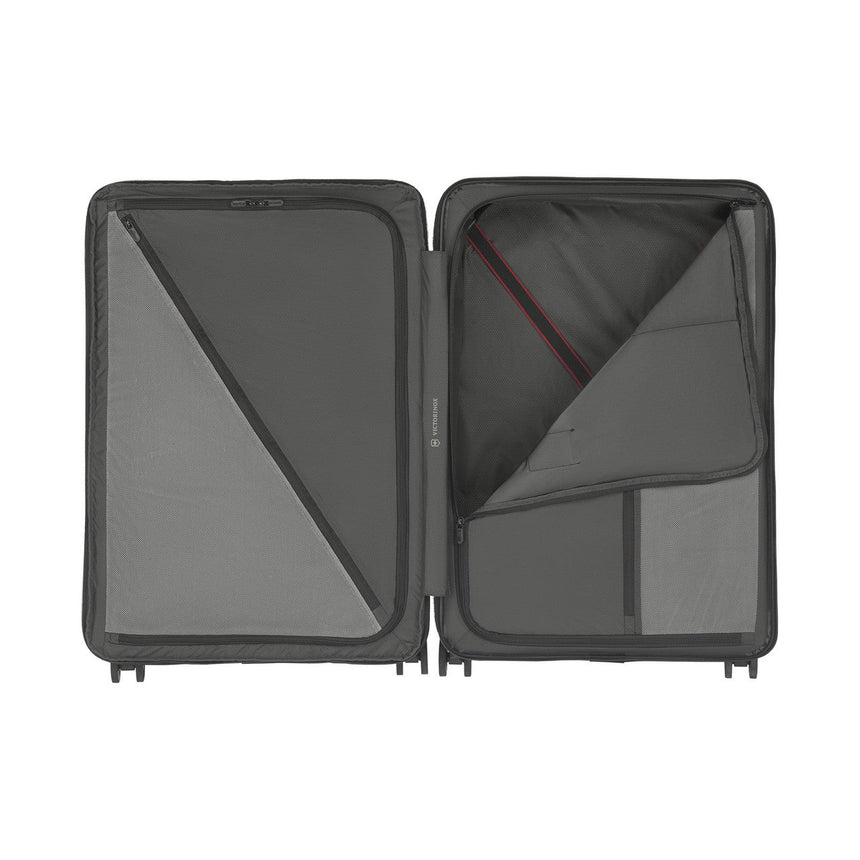 Open suitcase with compartments for organizing belongings.