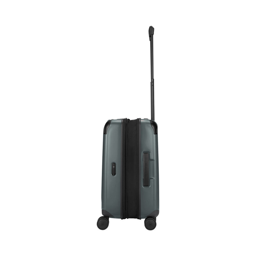 Dark gray hardshell suitcase with wheels and an extendable handle.