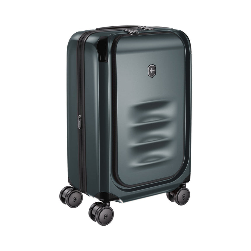 Dark gray hardshell rolling suitcase with four wheels and a textured front panel.