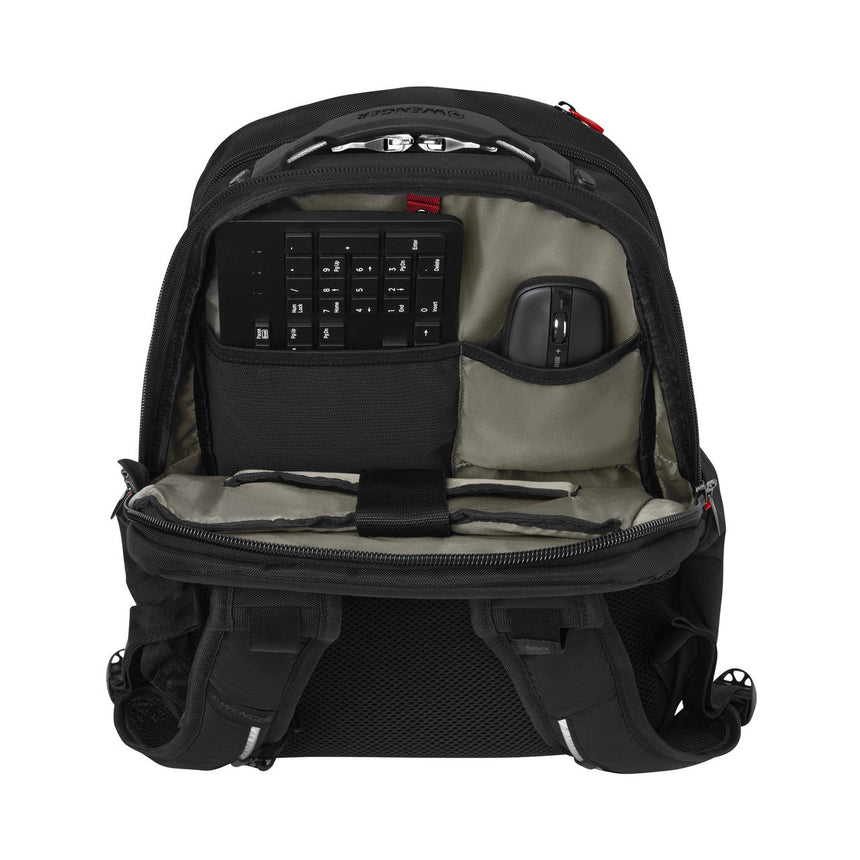 Black laptop backpack with open compartments showing a keyboard and mouse inside.