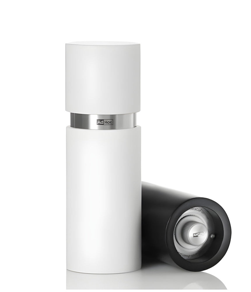 White cylindrical container with a metallic band and removable cap.