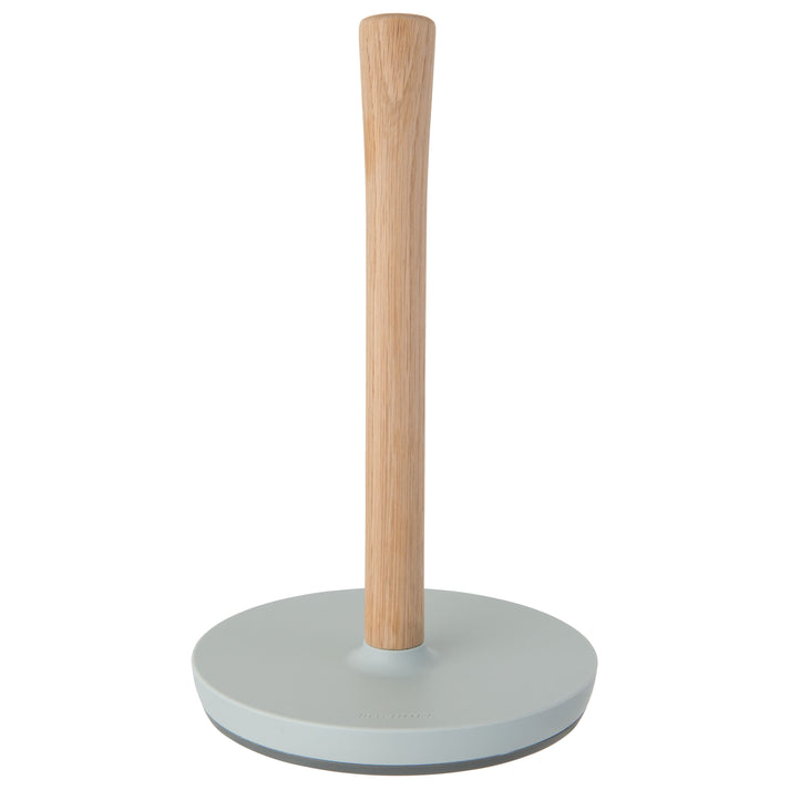 Paper towel holder with a wooden post and a light-colored base.