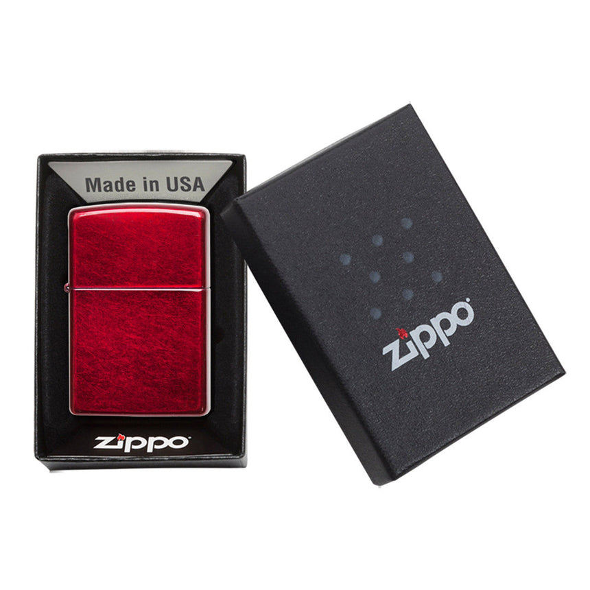 Red Zippo lighter in its packaging.