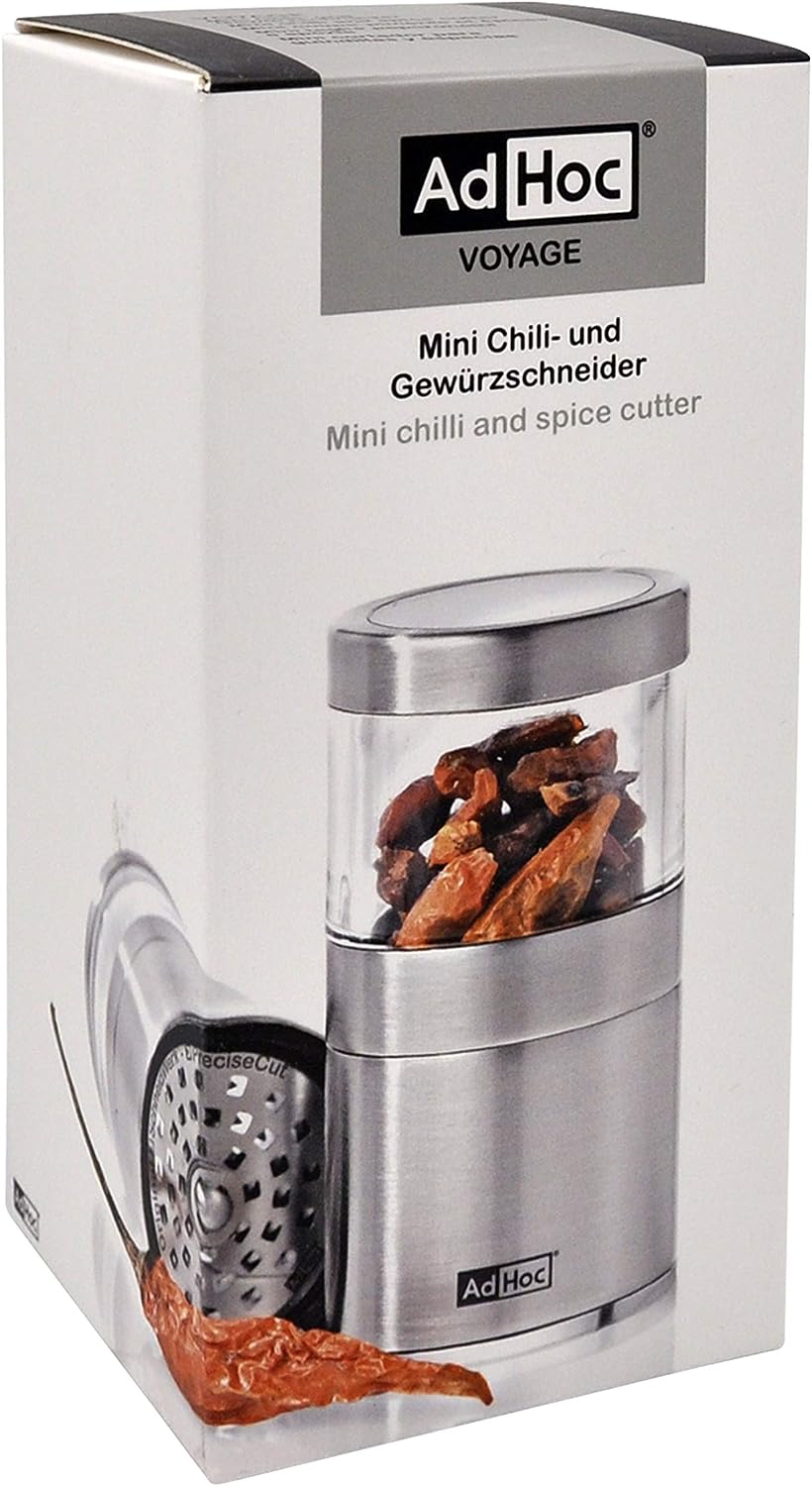 Mini chili and spice grinder with a clear container showing whole spices inside.