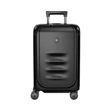 Black hardshell rolling suitcase with a retractable handle and four wheels.