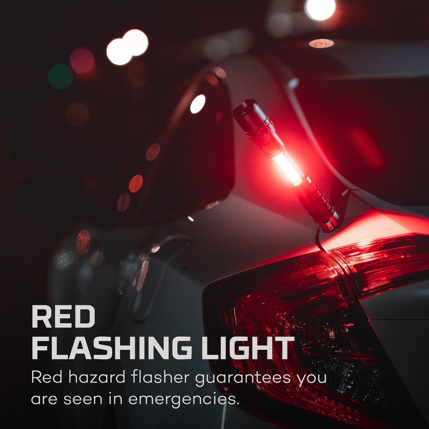 Red flashing emergency light or hazard flasher on a vehicle.