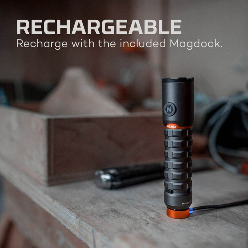 Rechargeable flashlight or torch with a textured grip and orange accents.