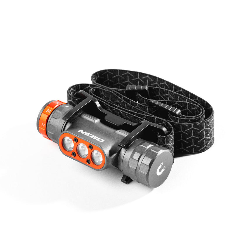 LED headlamp with an adjustable black strap and orange accents.