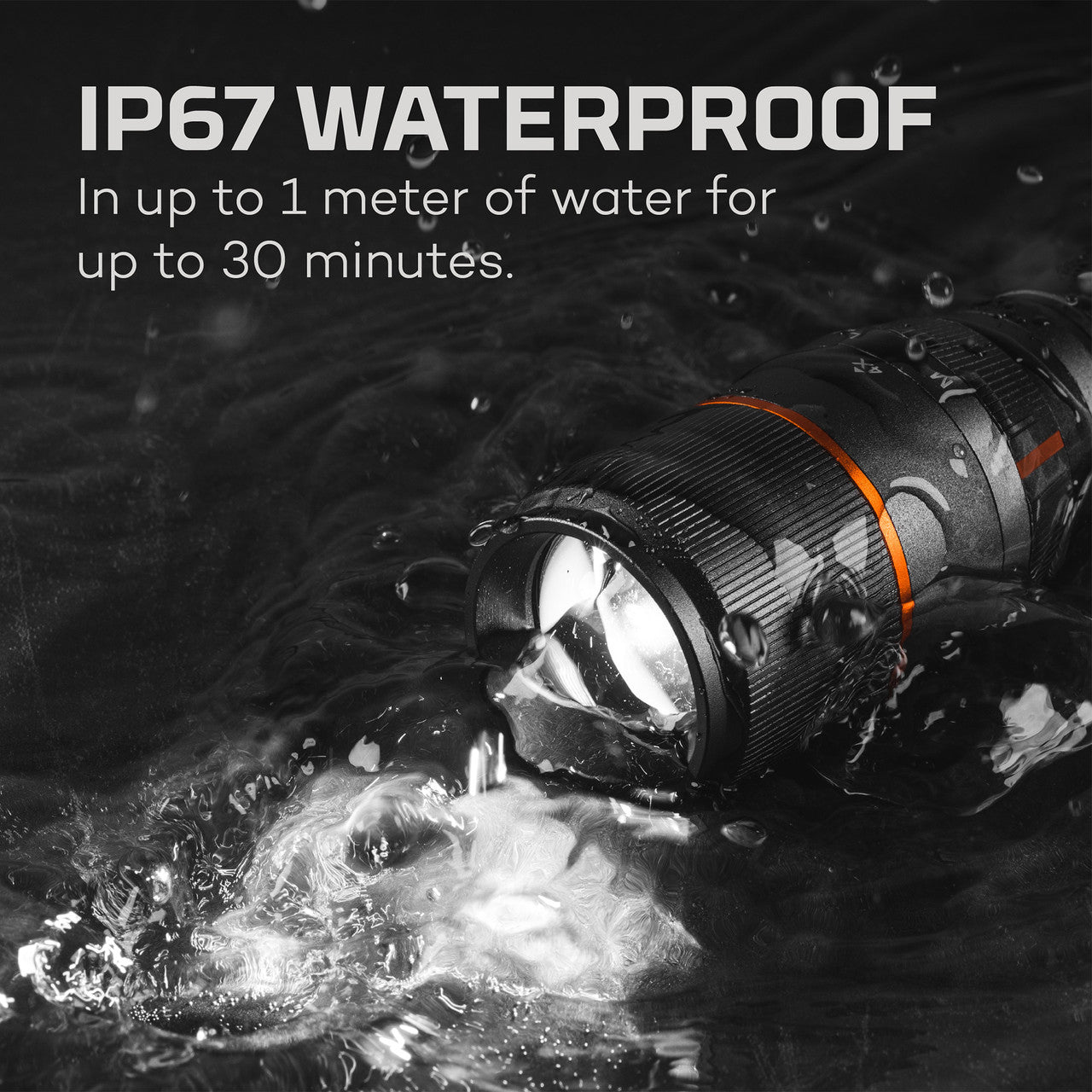 Waterproof flashlight submerged in water with bubbles surrounding it.