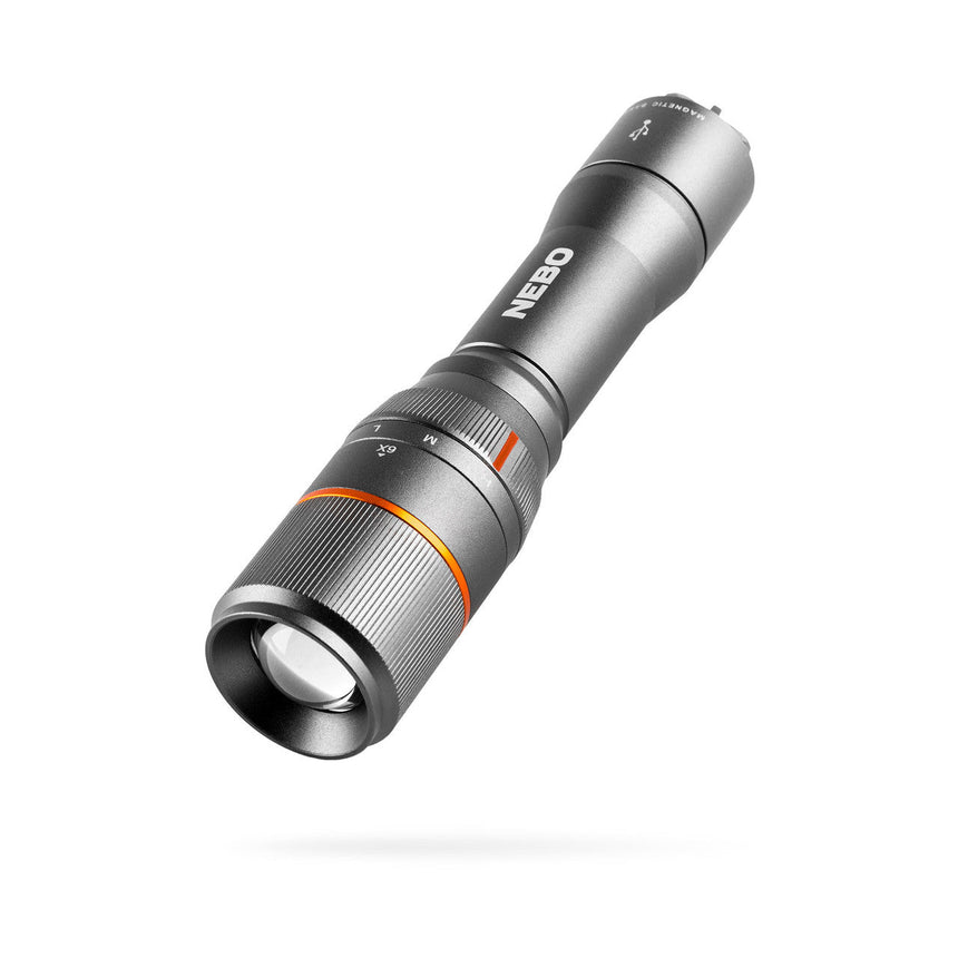 Metallic flashlight with adjustable focus and orange accent ring.