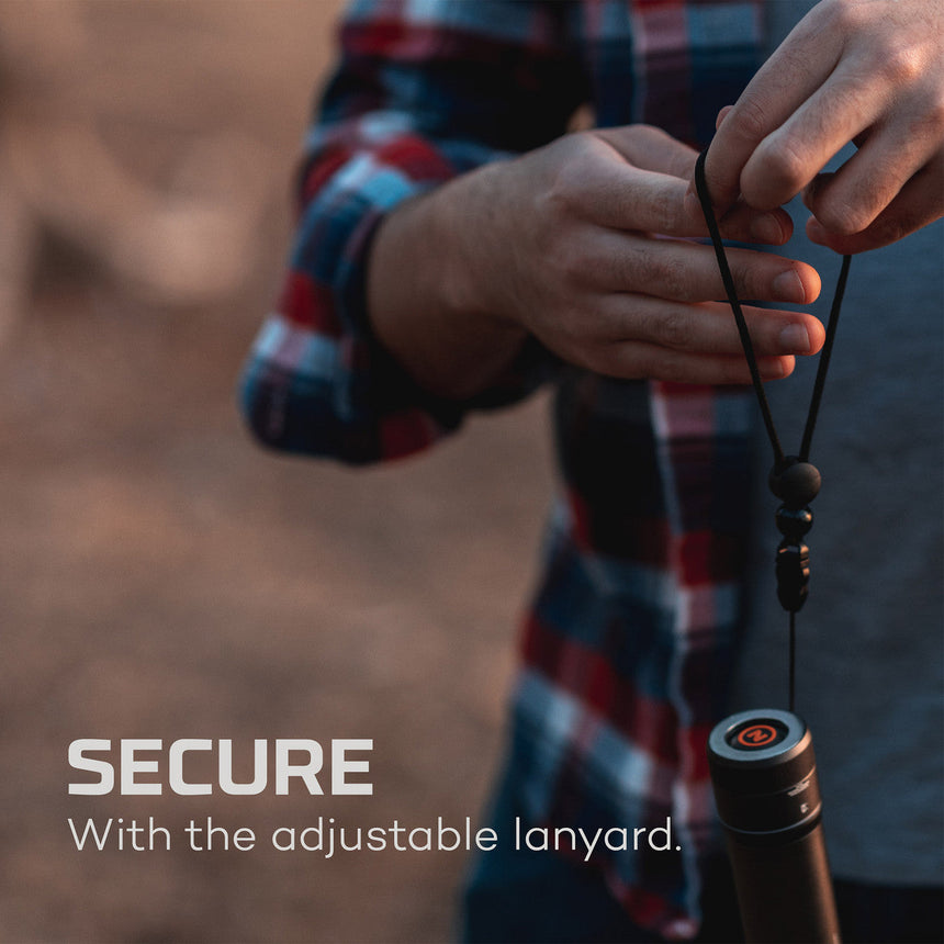 Adjustable lanyard attached to a cylindrical object, likely a water bottle or thermos.