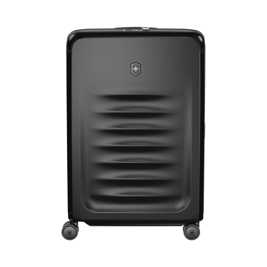 Black hardshell rolling suitcase with horizontal ridges on the front.