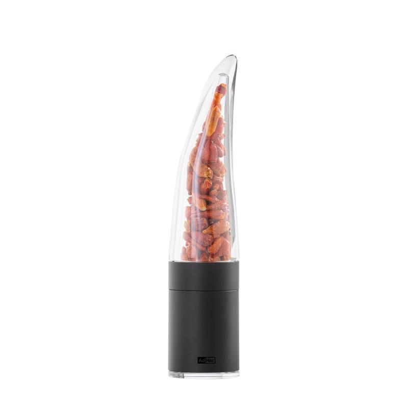 Electric pepper grinder with visible peppercorns in a clear chamber.