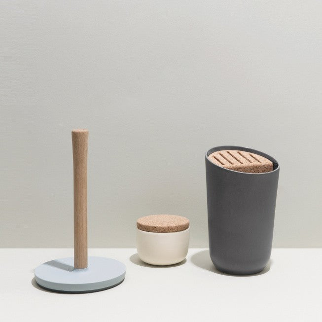 Minimalist kitchen set featuring a paper towel holder, container, and utensil holder.