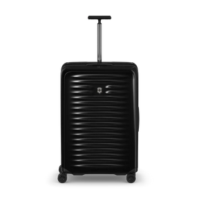 Black hard-shell rolling suitcase with horizontal ridges and an extendable handle.