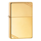 Gold-colored Zippo-style metal lighter with diagonal corner accents.