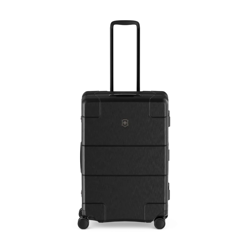 Black hardshell rolling suitcase with horizontal ridges and an extendable handle.