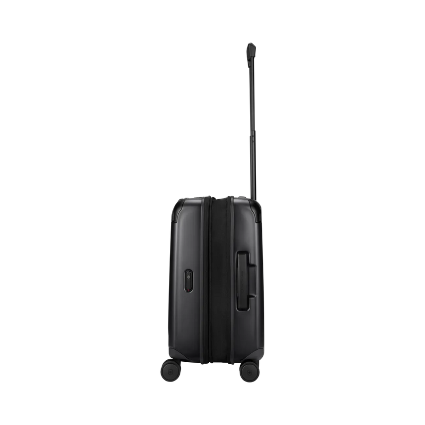 Black hard-shell rolling suitcase with an extendable handle.