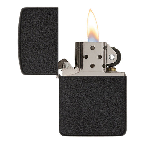 Lit black metal Zippo-style lighter with an open flame.