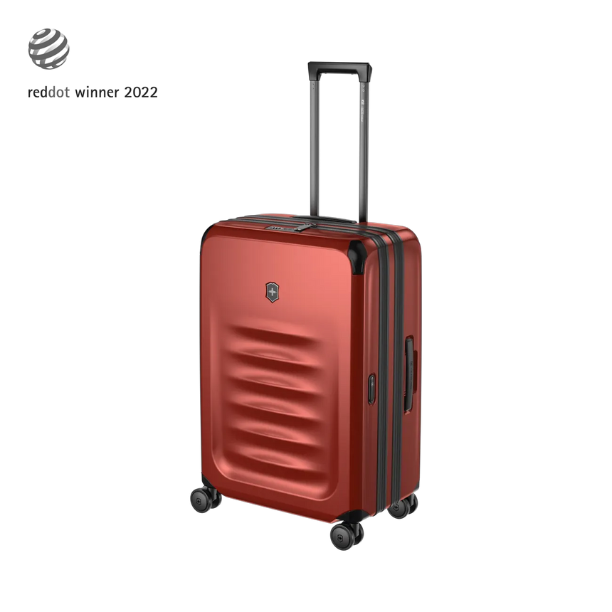 Red hardshell rolling suitcase with horizontal ridges and an extendable handle.