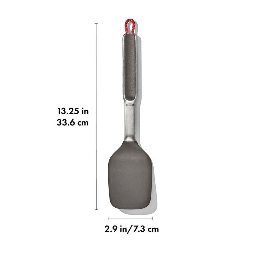 Kitchen spatula with a gray silicone head and metal handle.