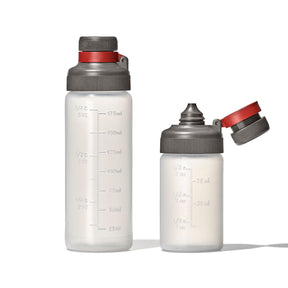 Two reusable water bottles with measurement markings and gray/red caps.