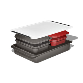 Stack of food storage containers in various colors and sizes.
