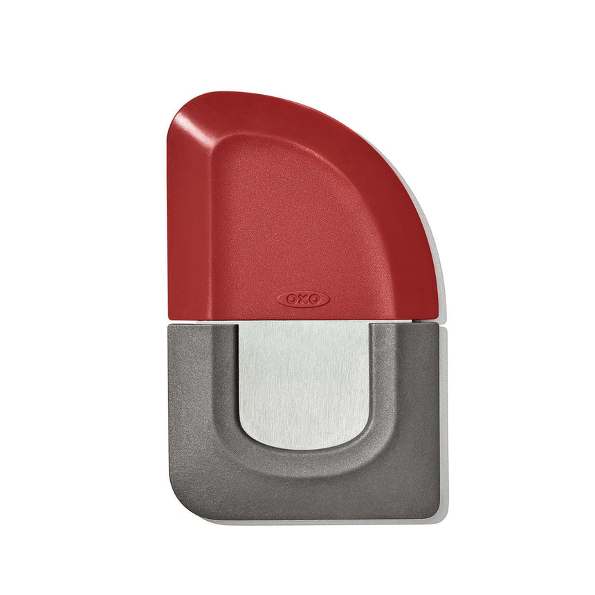 Compact red and gray device with a curved top and rectangular base.