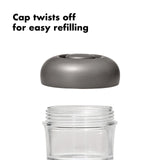 Clear jar or container with a gray twist-off cap.